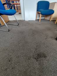 Worn traffic lane on office carpet before professional office carpet cleaning
