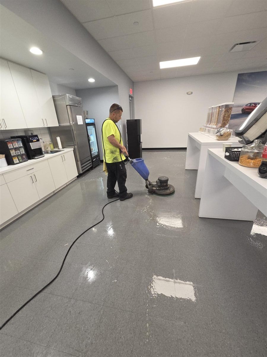 Done Just Right technician machine scrubbing hard floors in a Chicagoland break room